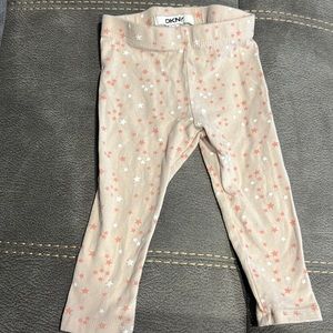 DKNY baby girl leggings cream color with white and pink stars. Size 12 months.